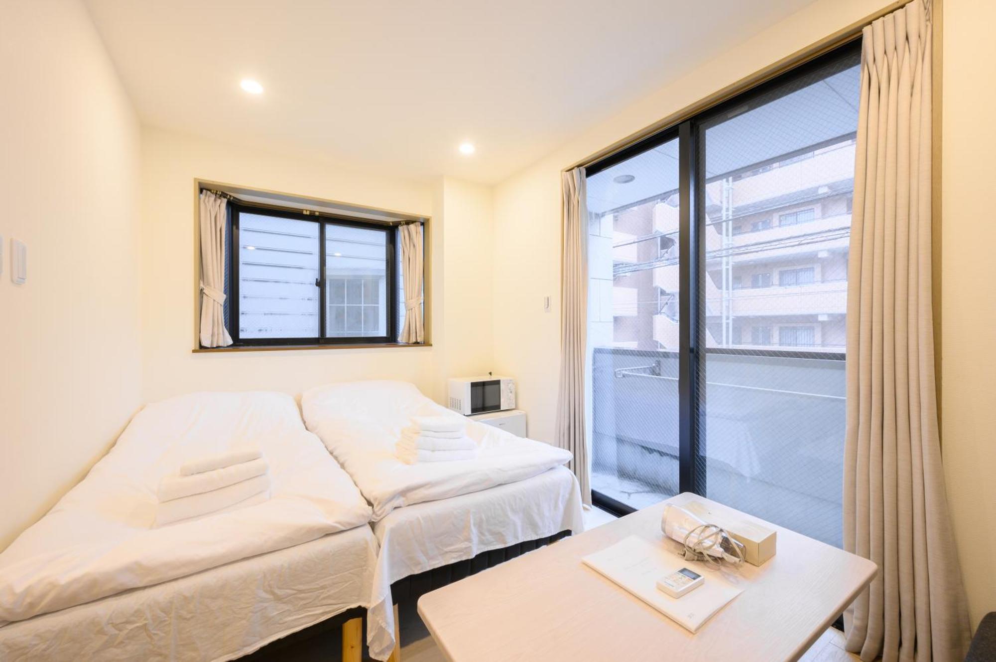 Oku Apartment Tokyo Bagian luar foto
