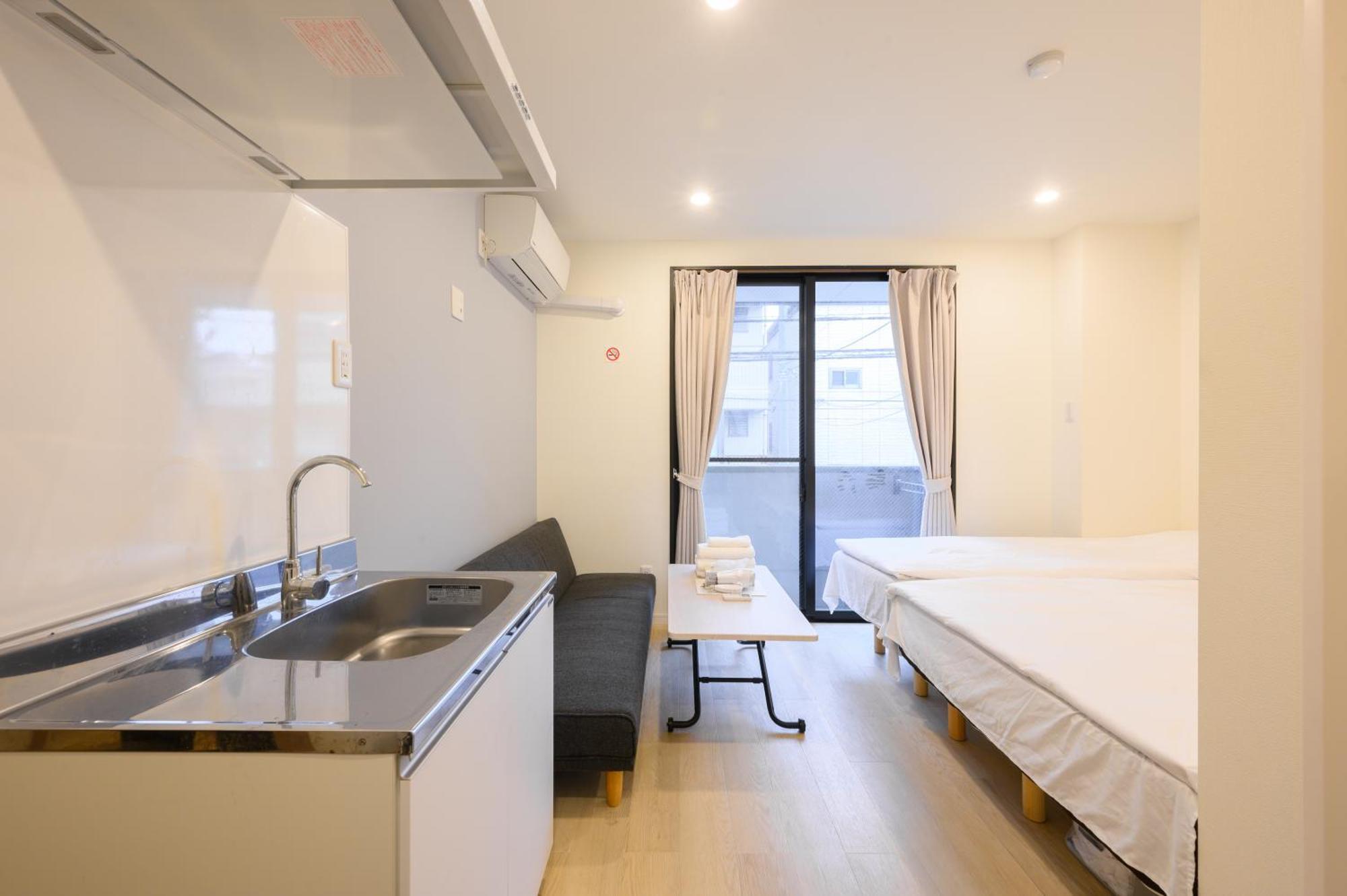 Oku Apartment Tokyo Bagian luar foto