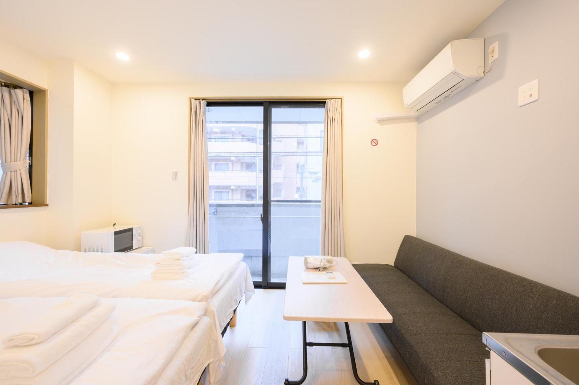 Oku Apartment Tokyo Bagian luar foto