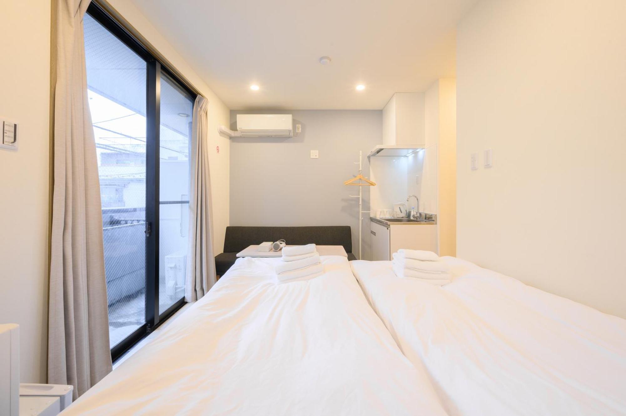 Oku Apartment Tokyo Bagian luar foto